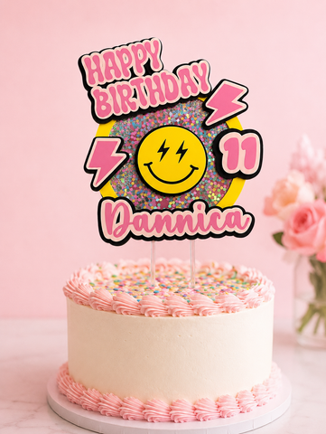 Custom smiley face 3D shaker birthday cake topper personalized with name and age featuring layered cardstock design and colorful shaker details.