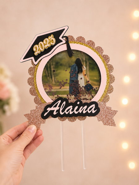 Custom photo 3D shaker cake topper featuring a personalized photo, graduation year, and custom name with layered cardstock construction and acrylic cake stakes.